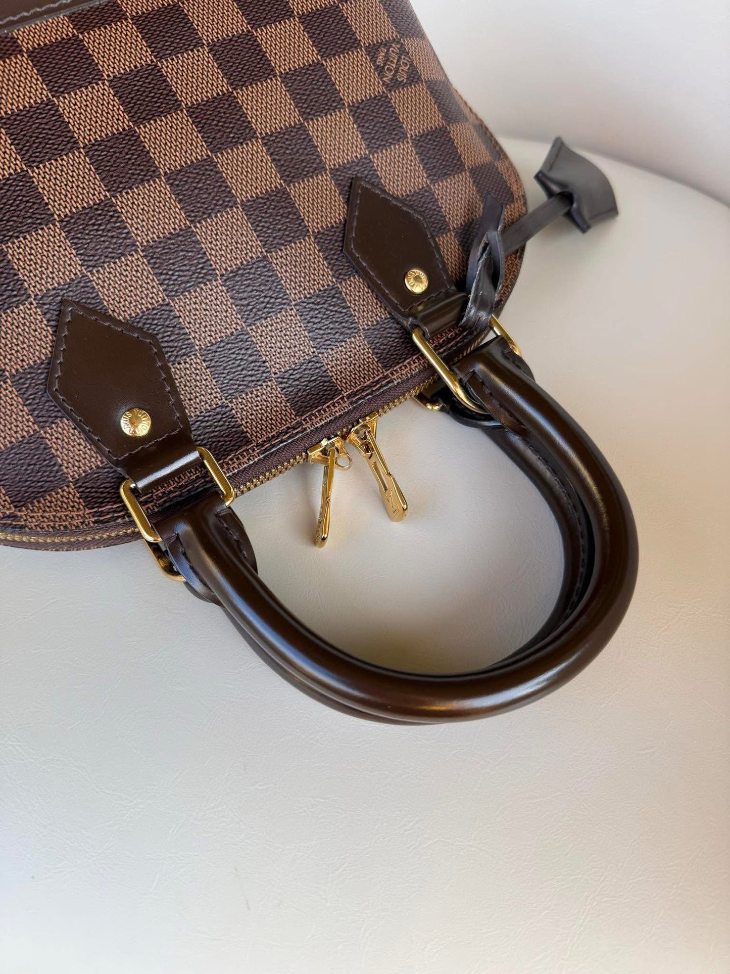 Louis Vuitton Alma BB in Damier Ebene canvas
