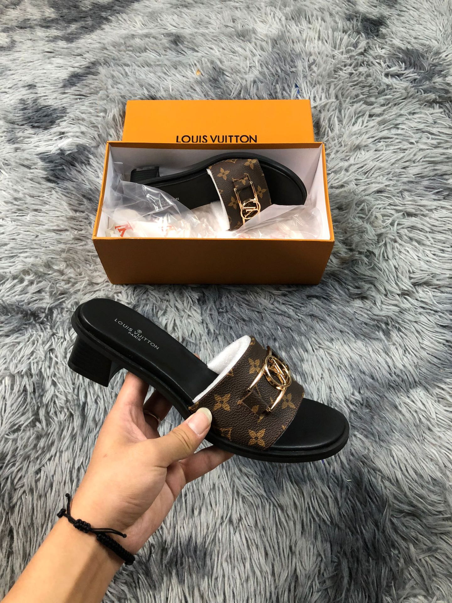 LV Lock It leather mules sandals
